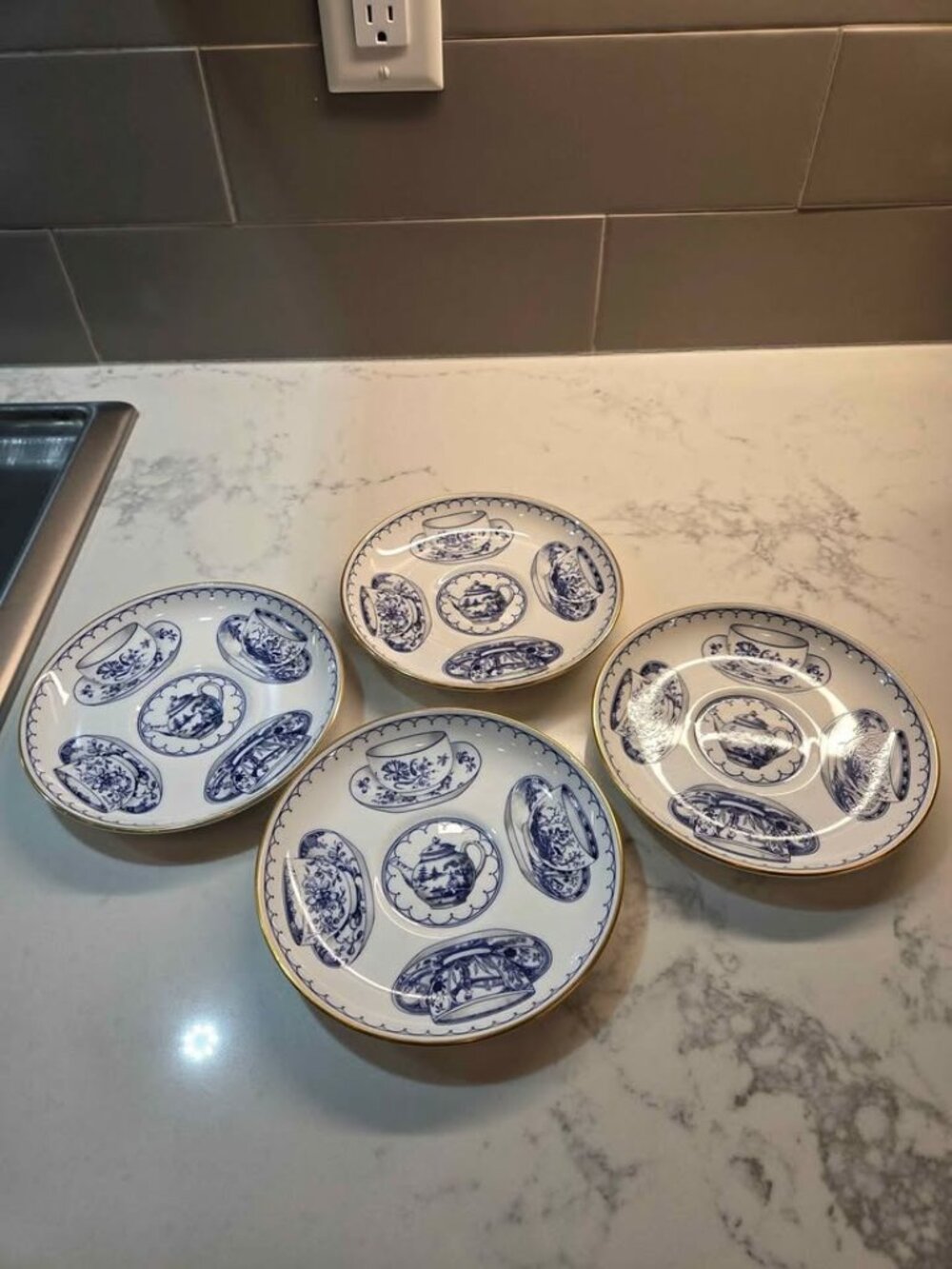 4 Royal Worcester plates "cup of cups"